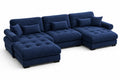 Divano componibile in velluto blu con cuscini